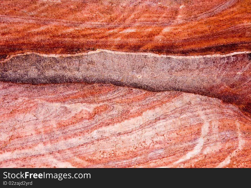 Patterns in brightly coloured stone at Petra