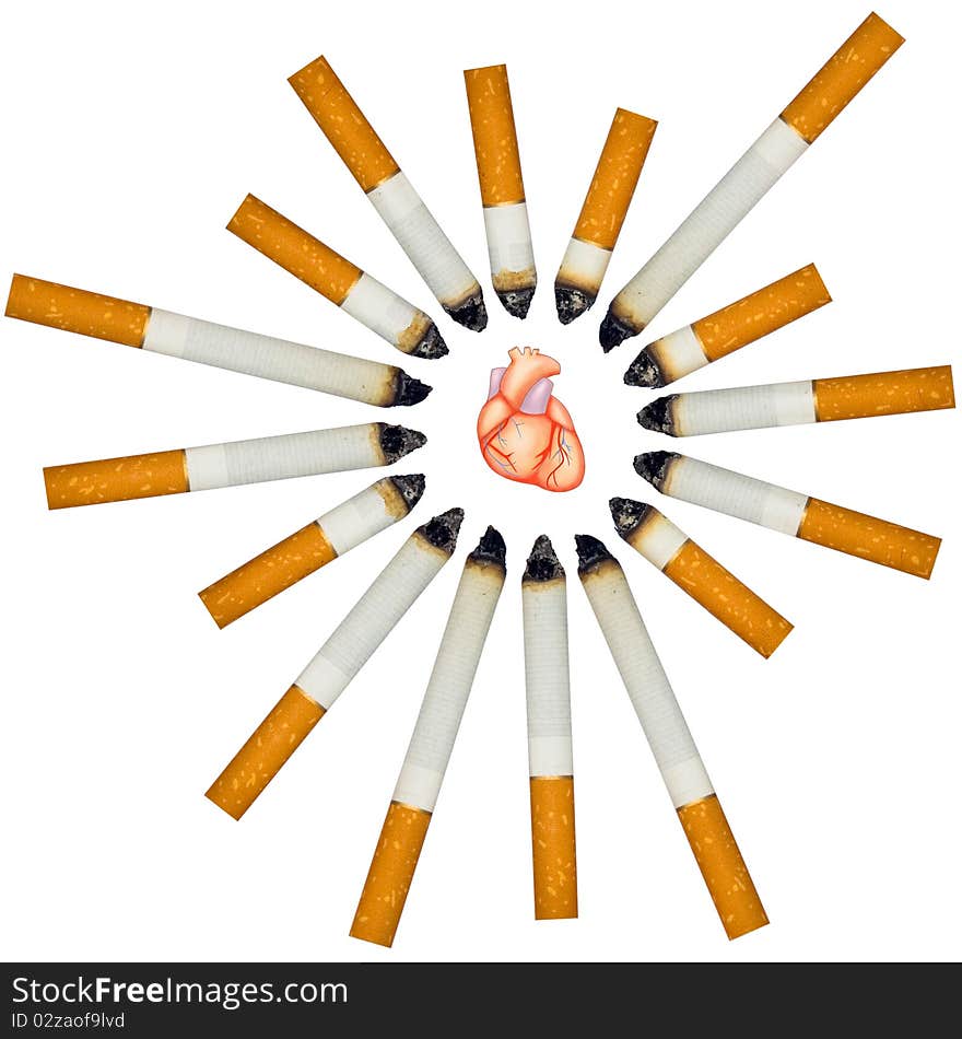 Small human heart against numerous cigarettes