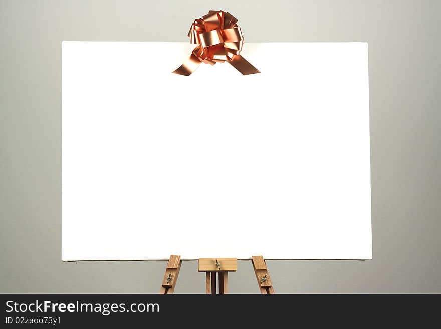 White blank canvas on easel. White blank canvas on easel