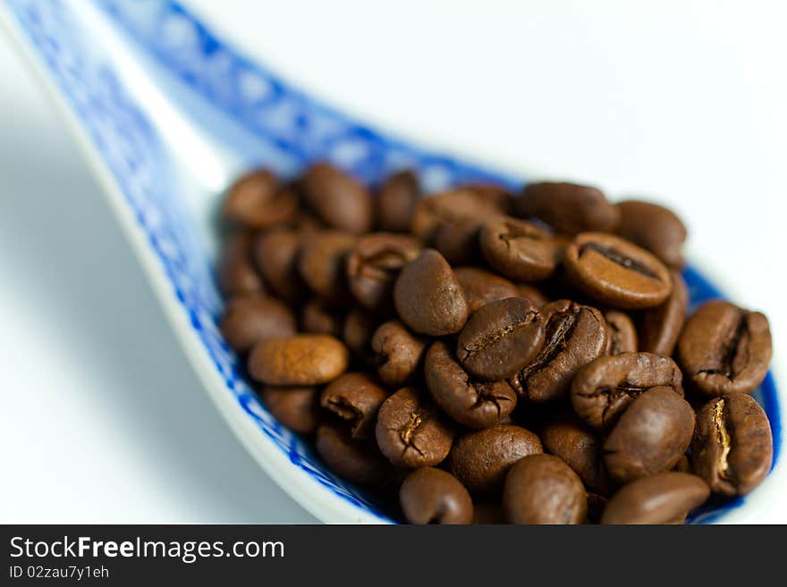 Coffebeans on a chineese spoon