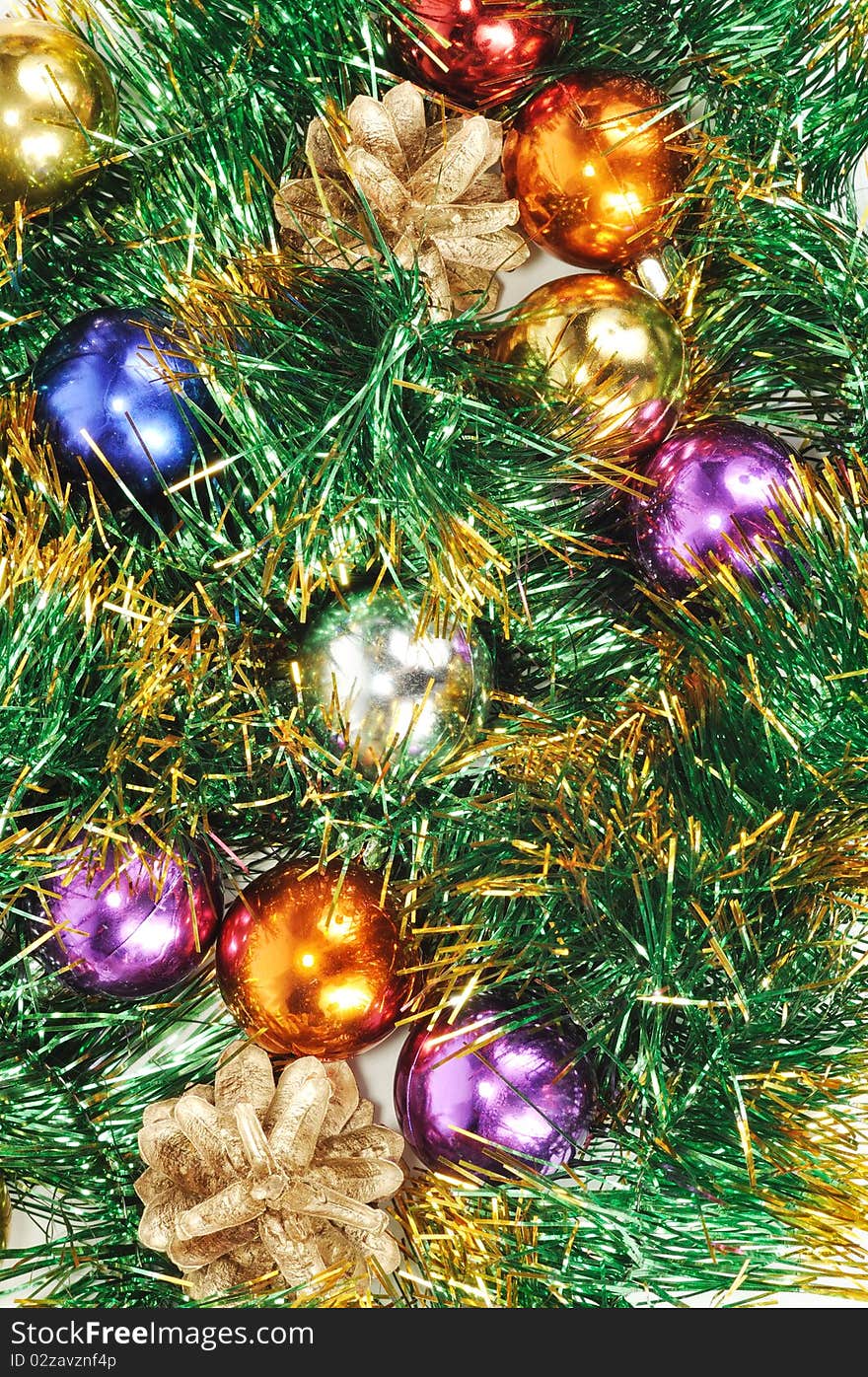 Christmas background with colorful balls and cones