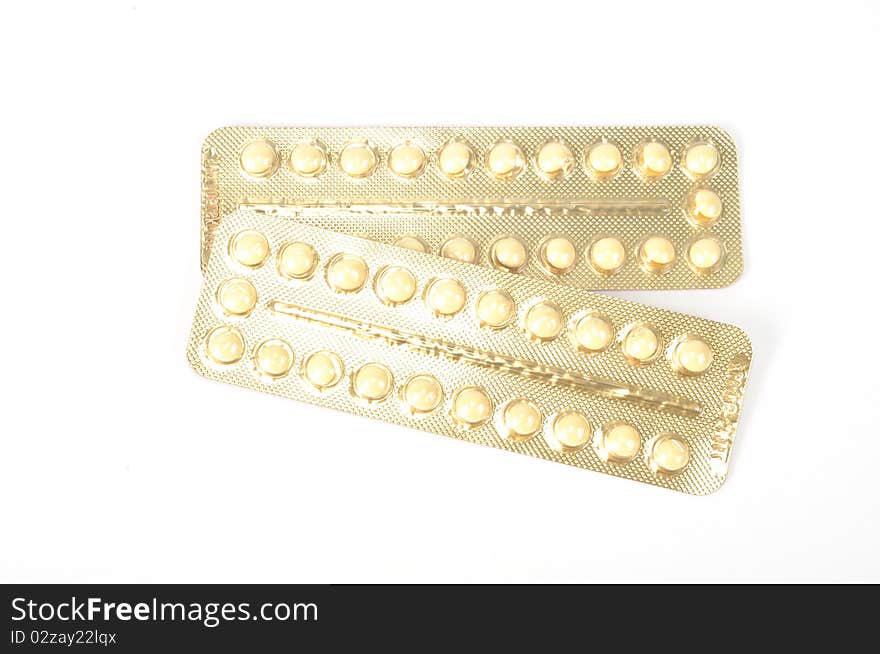 Baby control pills , isolated on a white background