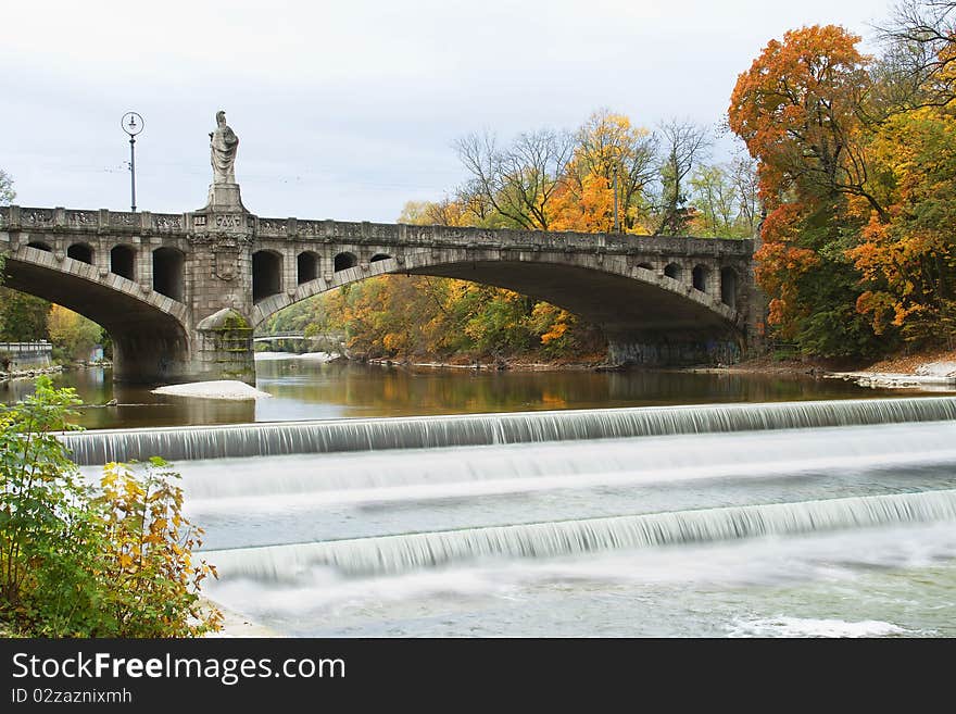 Bridge and a minor waterfall in Munich, Germany