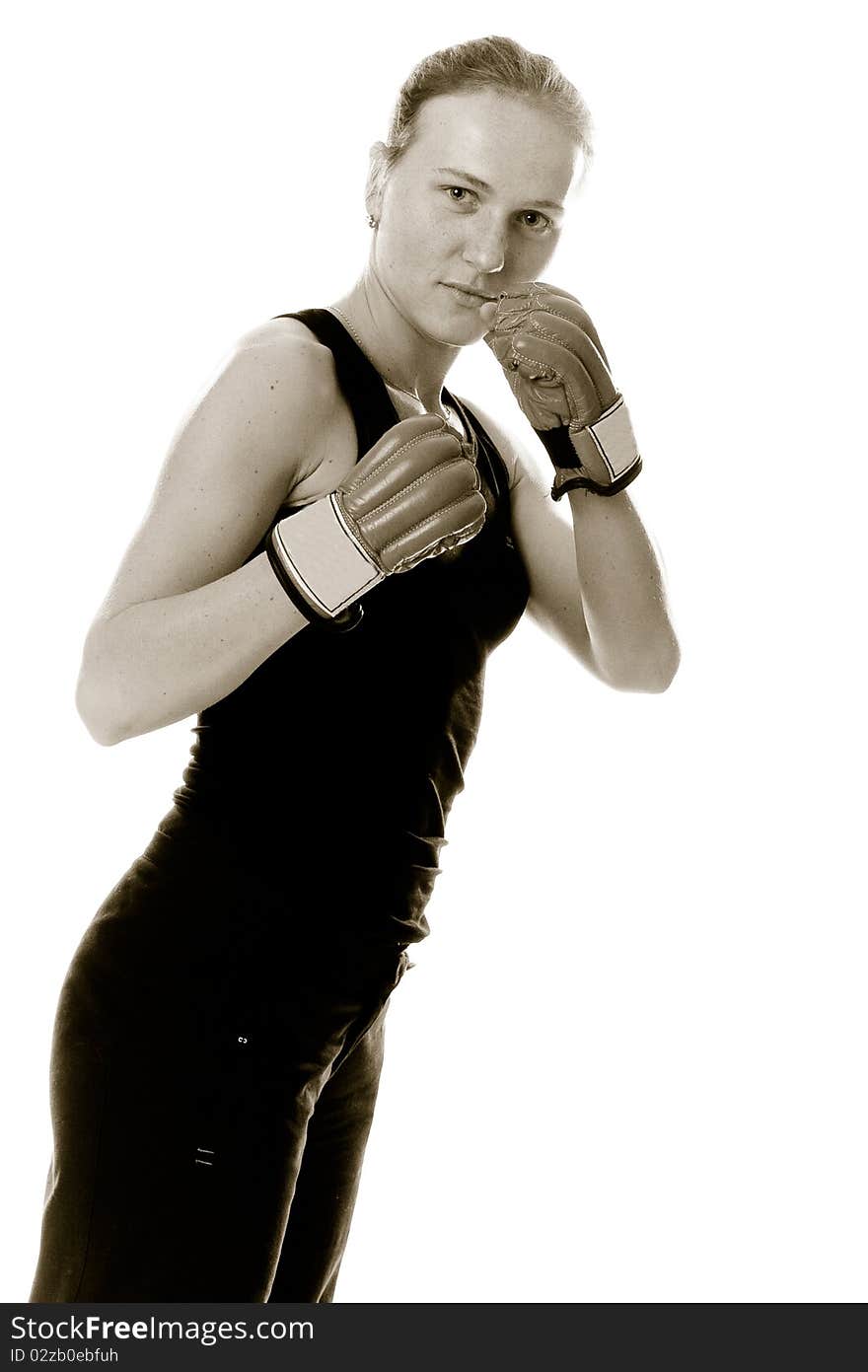 Beautiful girl with boxing gloves. Isolated.