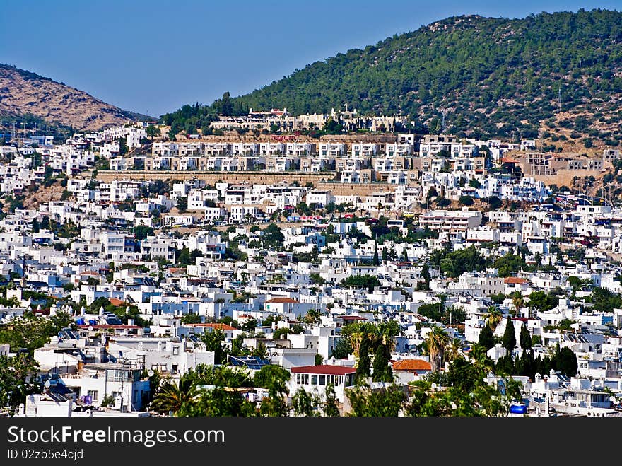 White summer houses in a luxury location on a hill. White summer houses in a luxury location on a hill