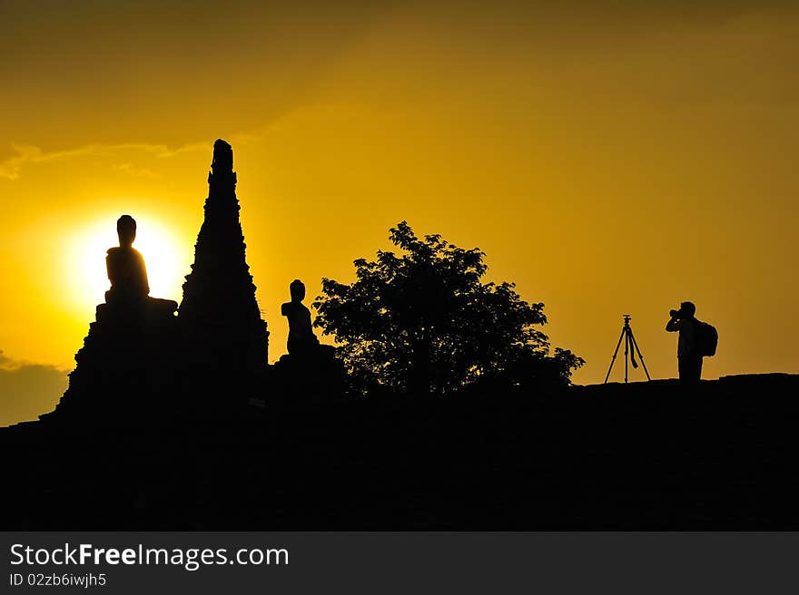 Silhouette Photographer With Buddha