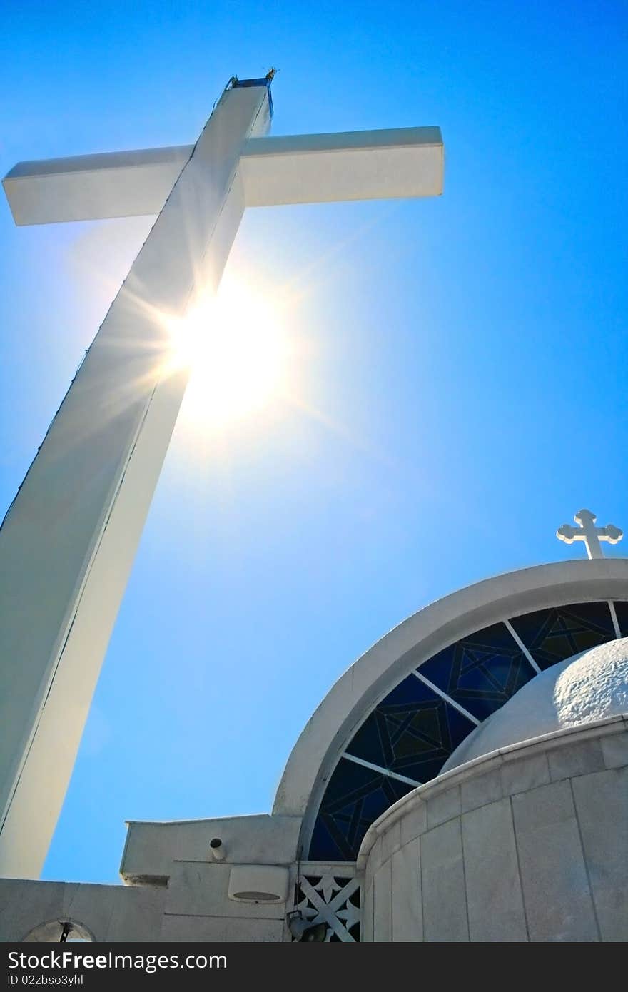 Big cross and light on it.