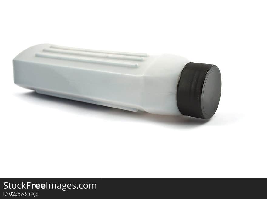 Bottle of toner on a white background