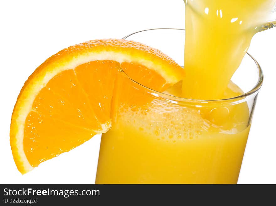 Orange juice with slice of orange on white background