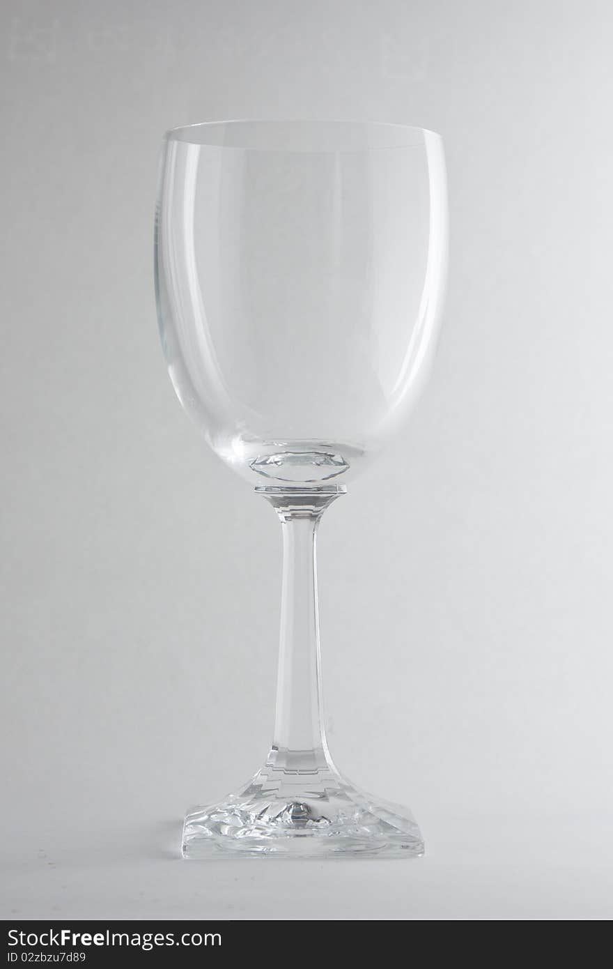 A transparent glass with a white background