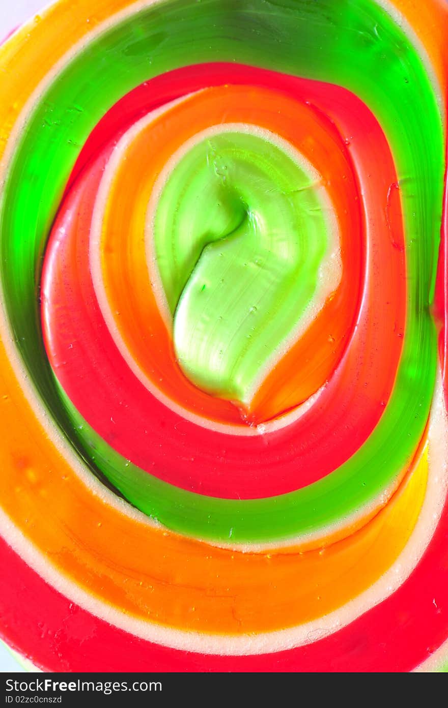 Macro on a spiral lollipop with live colors. Macro on a spiral lollipop with live colors