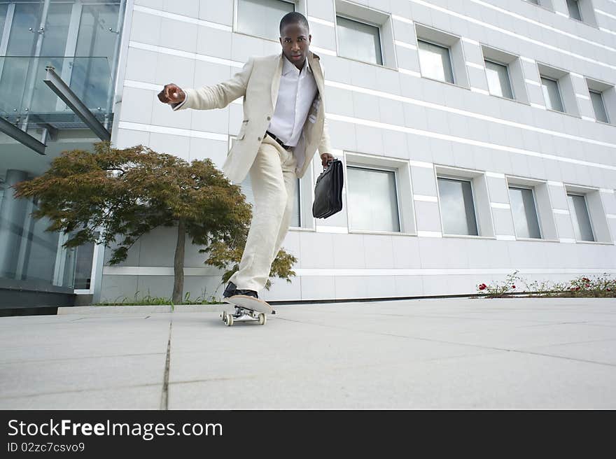 Businessman on skateboard