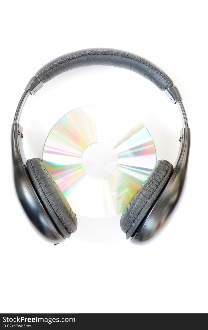 Close-up view of headphone with compact disc. Close-up view of headphone with compact disc.