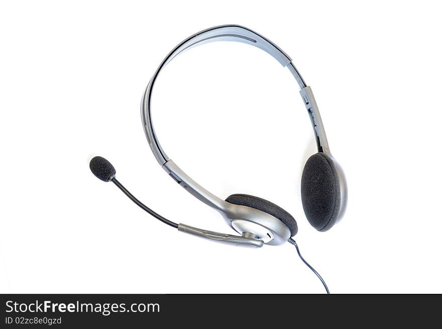 Black headphone with microphone isolated on a white background