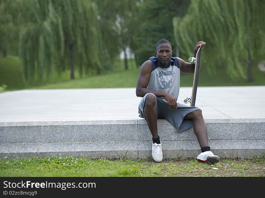 Young Man With Skateboard