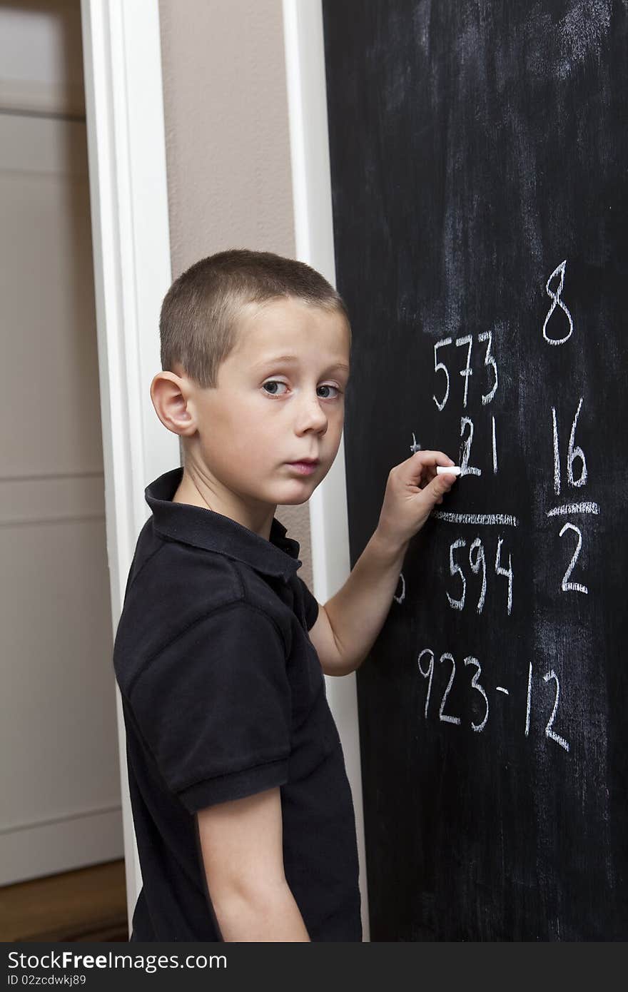 Boy at the blackboard