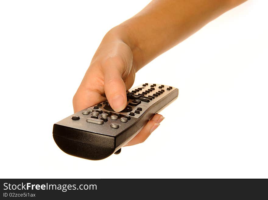 Human hand on remote