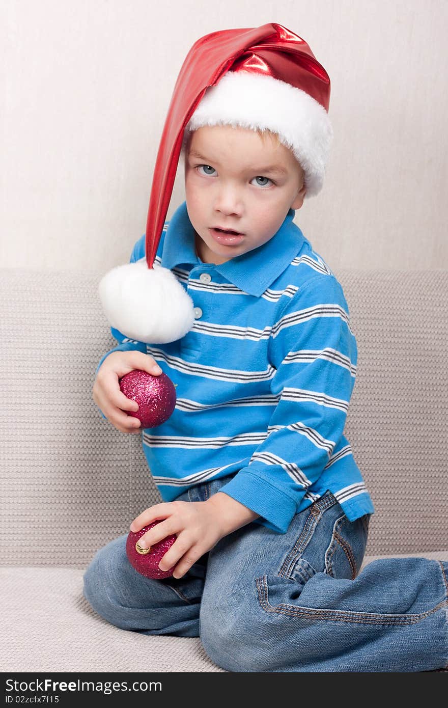 Boy in red christmas hat