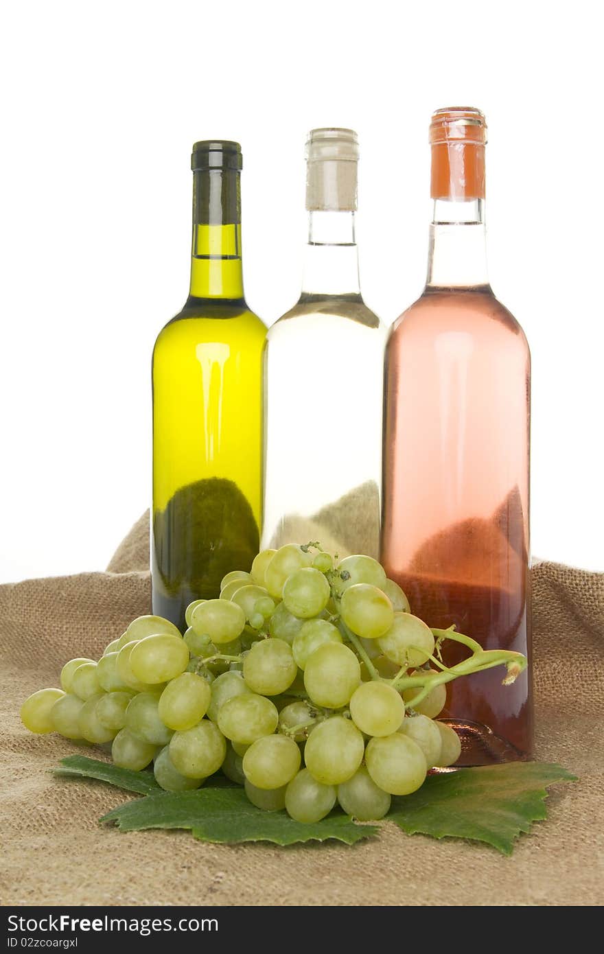 Wine and grapes, on white background. Wine and grapes, on white background.