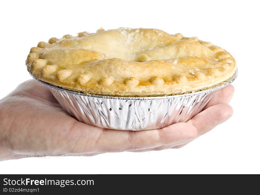 Hand Holding An Apple Pie