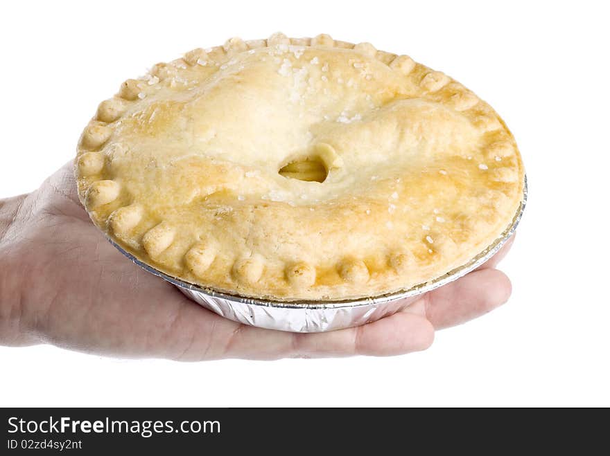 Hand Holding an Apple Pie