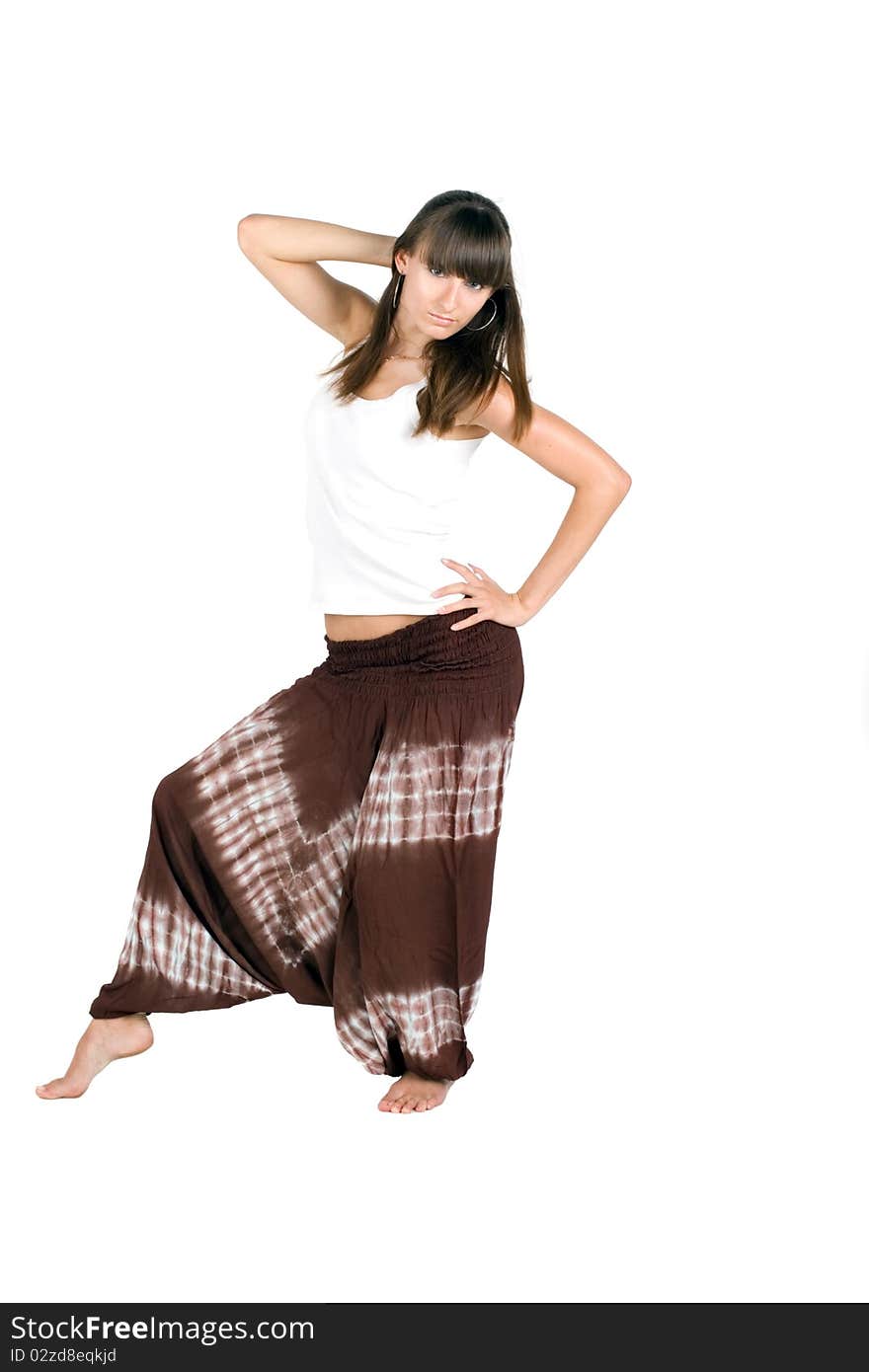 Pretty girl in ethnic trousers studio shot