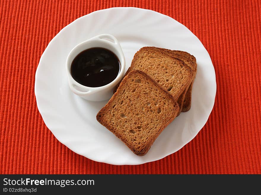 Toasts with jam on a plate