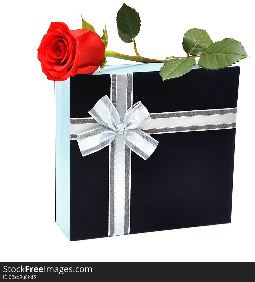 Beautiful red rose and present with ribbon. Beautiful red rose and present with ribbon