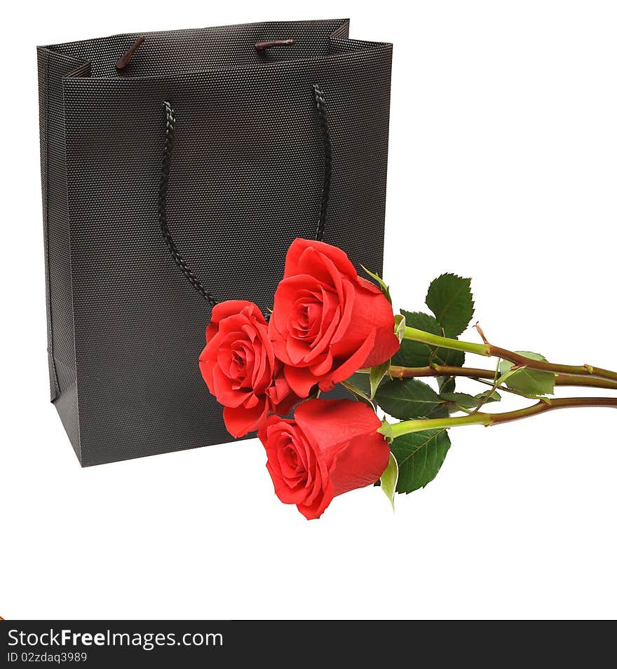 Black gift bag with red rose