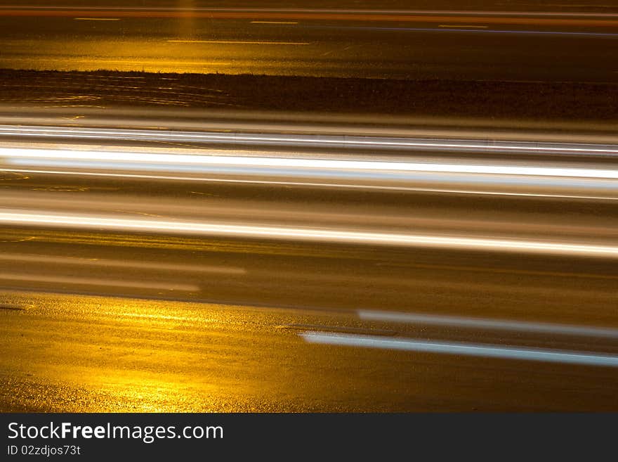 Road night asphalted with shone traces of the passed cars. Road night asphalted with shone traces of the passed cars