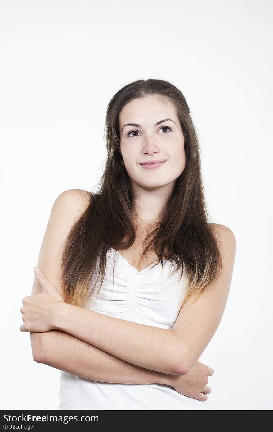 Portrait of beautiful young smiling girl with freckles, isolated on white background