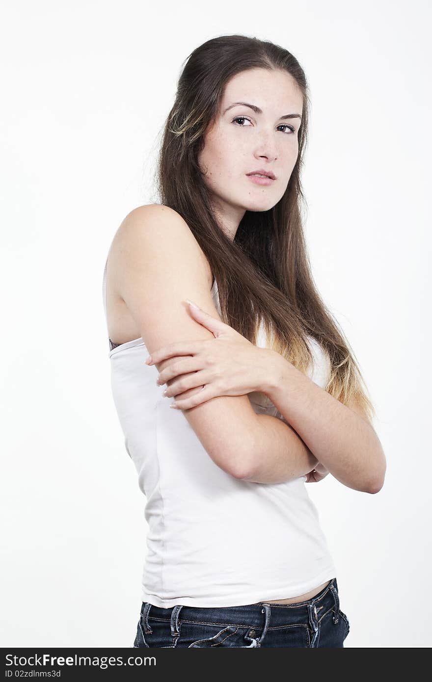 Portrait of beautiful young smiling girl with freckles, isolated on white background