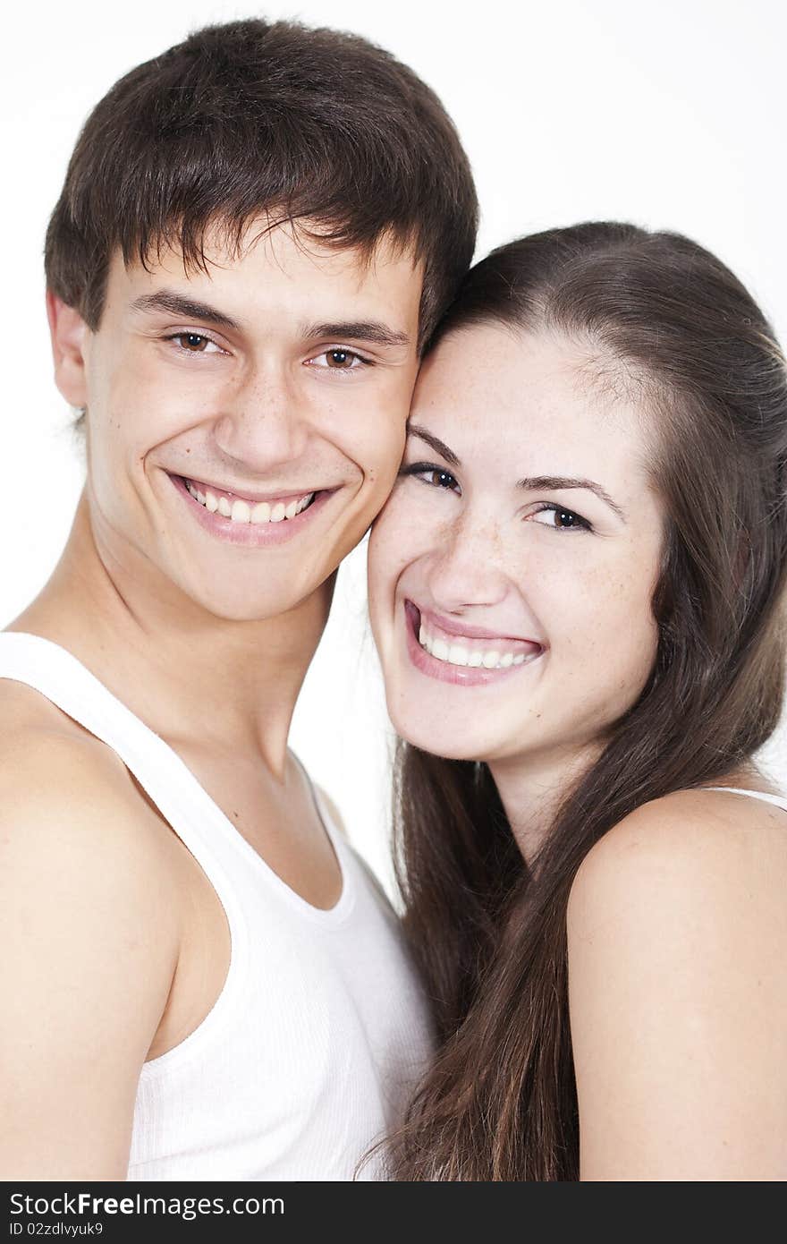 Portrait of a beautiful young happy smiling couple. Portrait of a beautiful young happy smiling couple