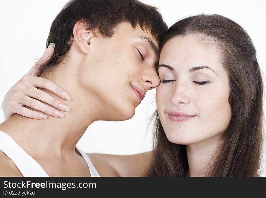 Portrait of a beautiful young happy smiling couple. Portrait of a beautiful young happy smiling couple