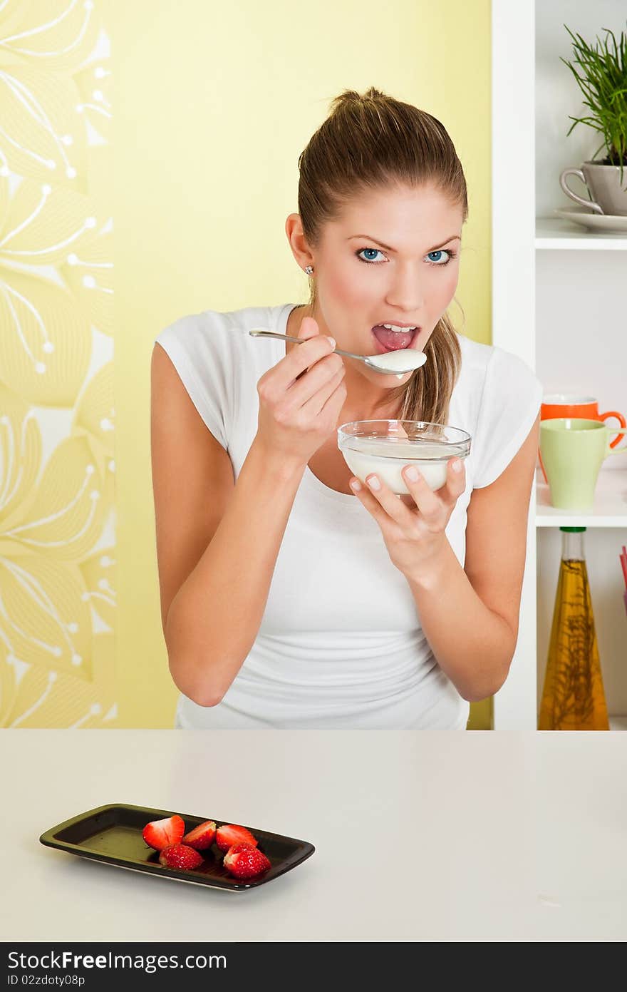 Beauty, young girl eating breakfast