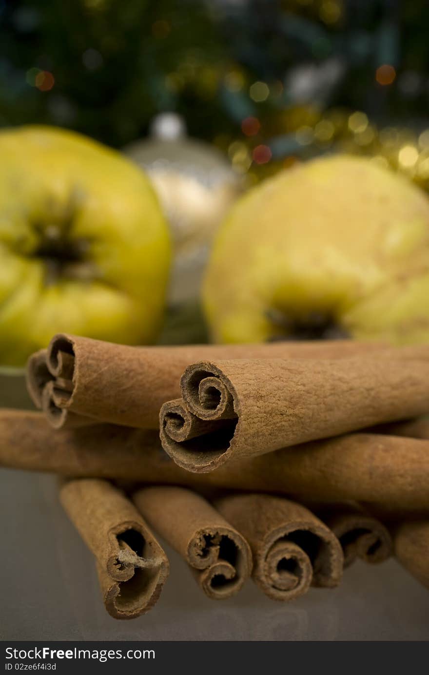 Cinnamon and apples close up photo