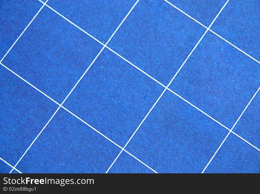 Paper abstract blue background with white crossed lines.