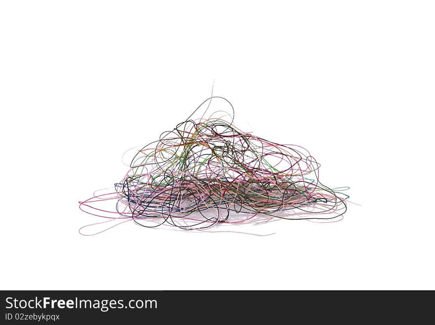 A Pile of Loose Thread on a White Background