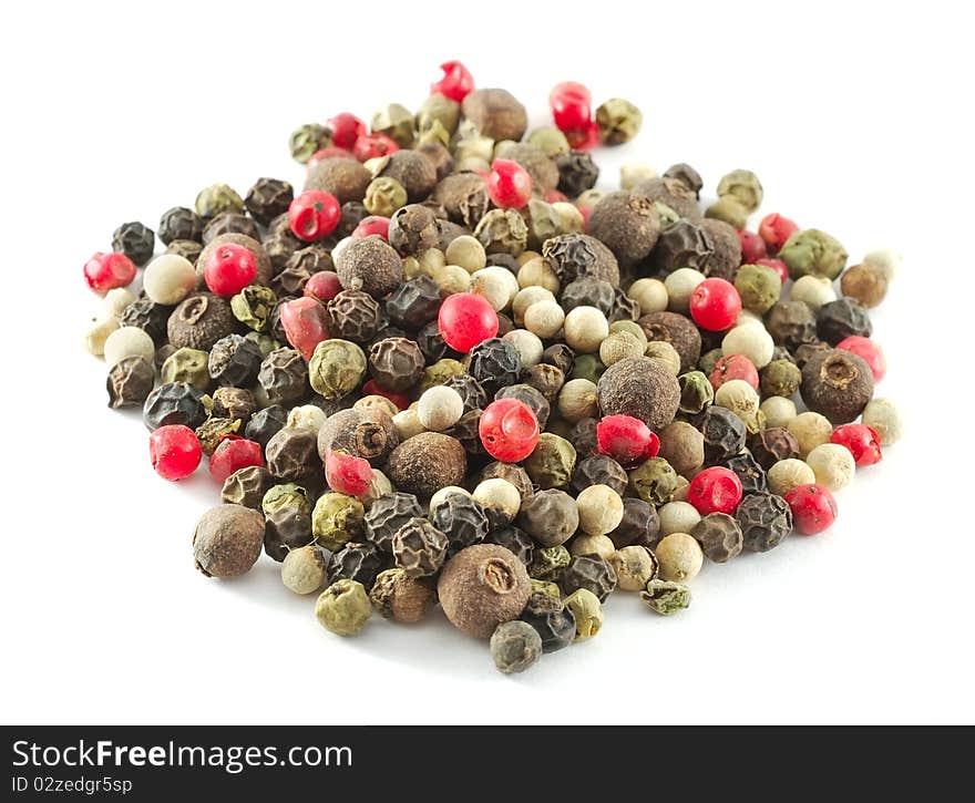 Closeup of mixed pepper isolated on white background.