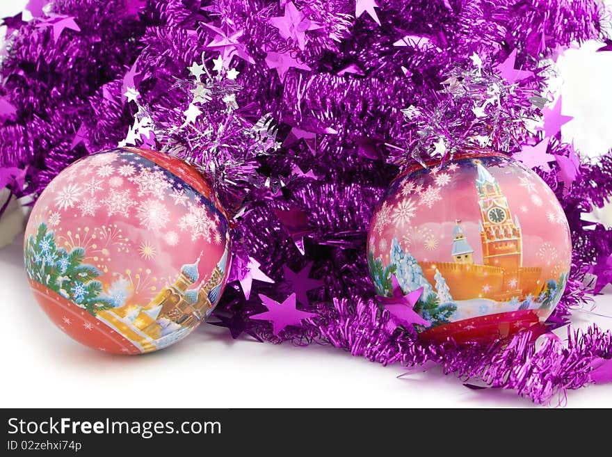 Christmas balls with fairy tale winter pictures in to a tinsel. Christmas balls with fairy tale winter pictures in to a tinsel.