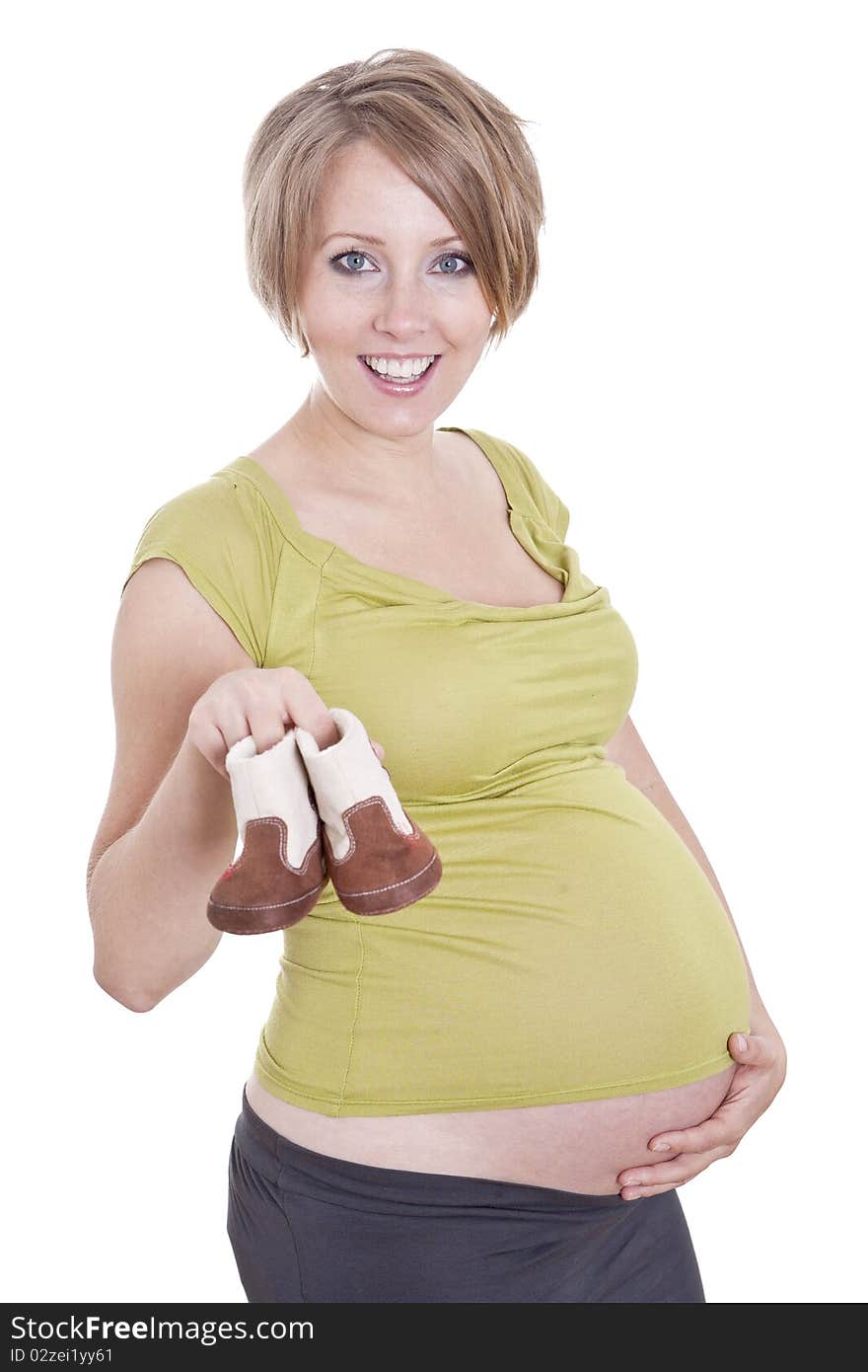 Pregnant pretty woman in studio over white background. Pregnant pretty woman in studio over white background