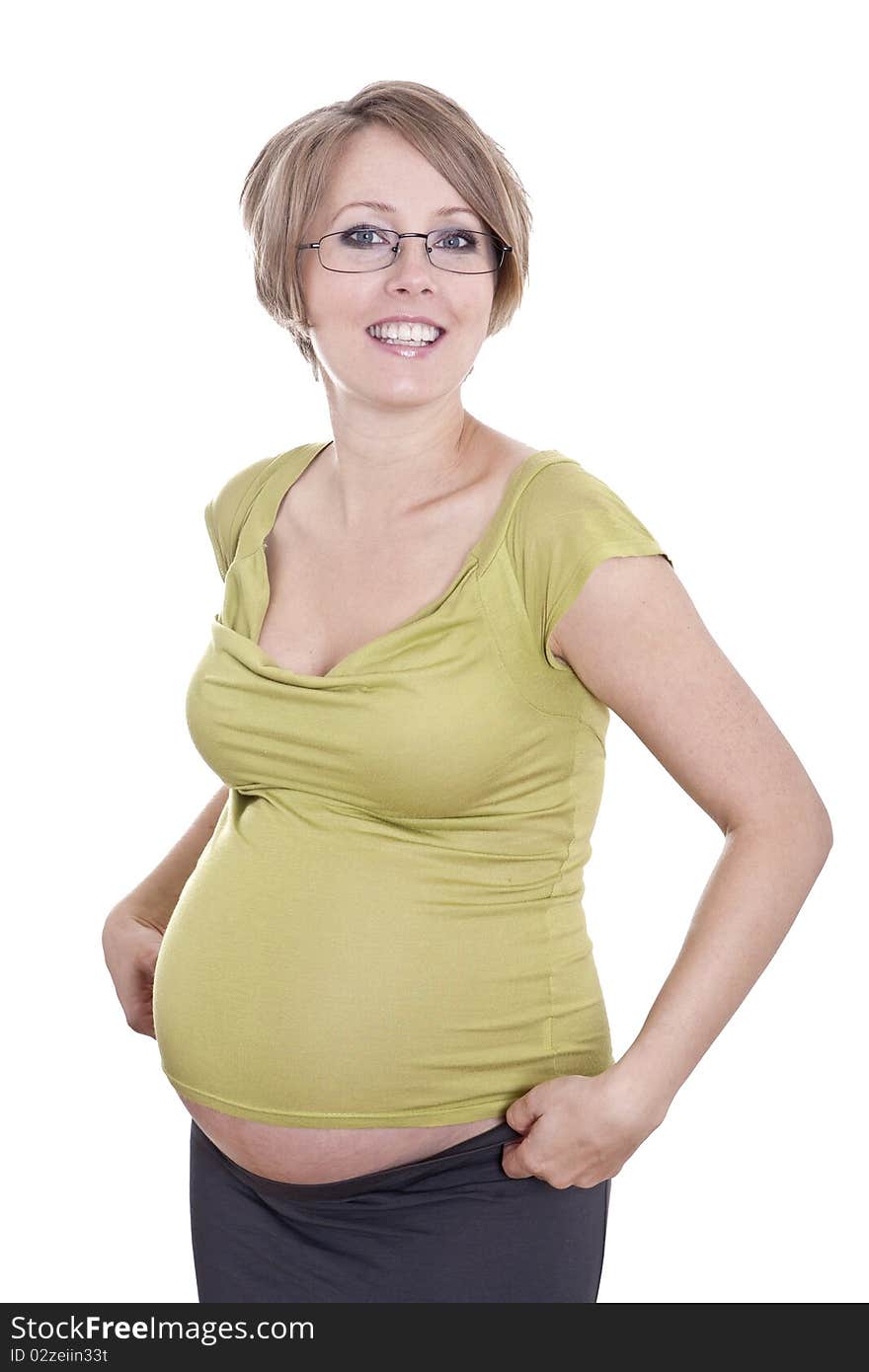 Pregnant pretty woman in studio over white background. Pregnant pretty woman in studio over white background