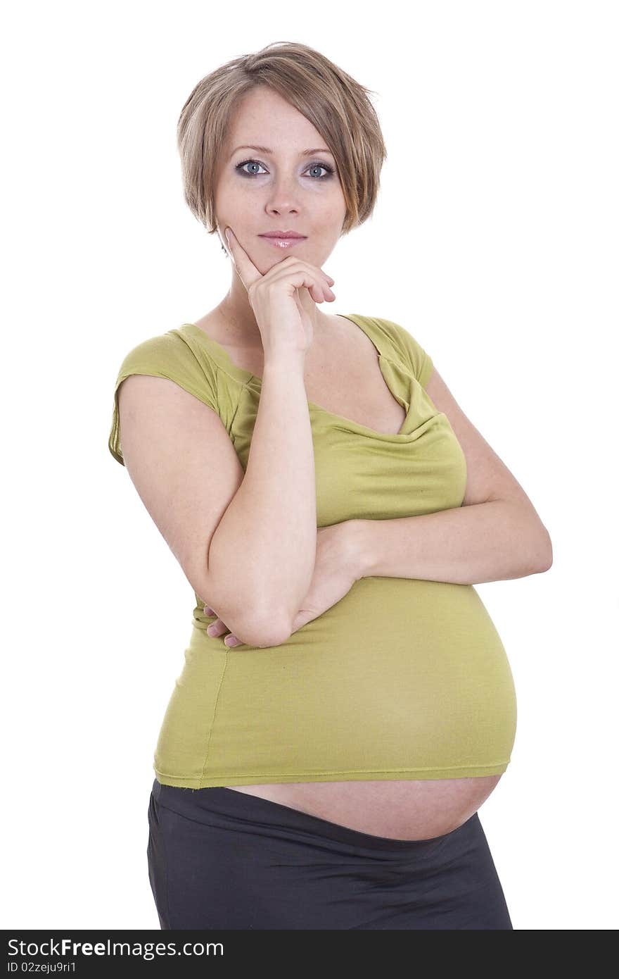 Pregnant pretty woman in studio over white background. Pregnant pretty woman in studio over white background