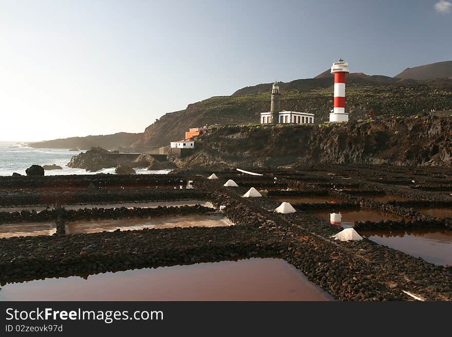 La Palma lighhouse as seen from the salt ponds nearby. La Palma lighhouse as seen from the salt ponds nearby.