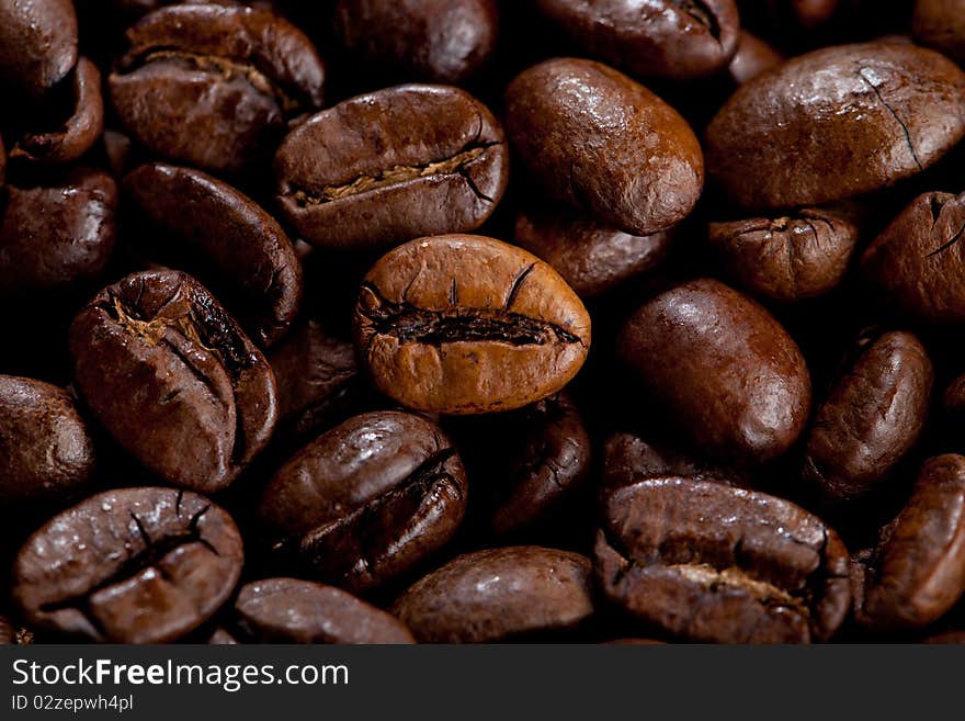 Close up view of some roasted coffee beans