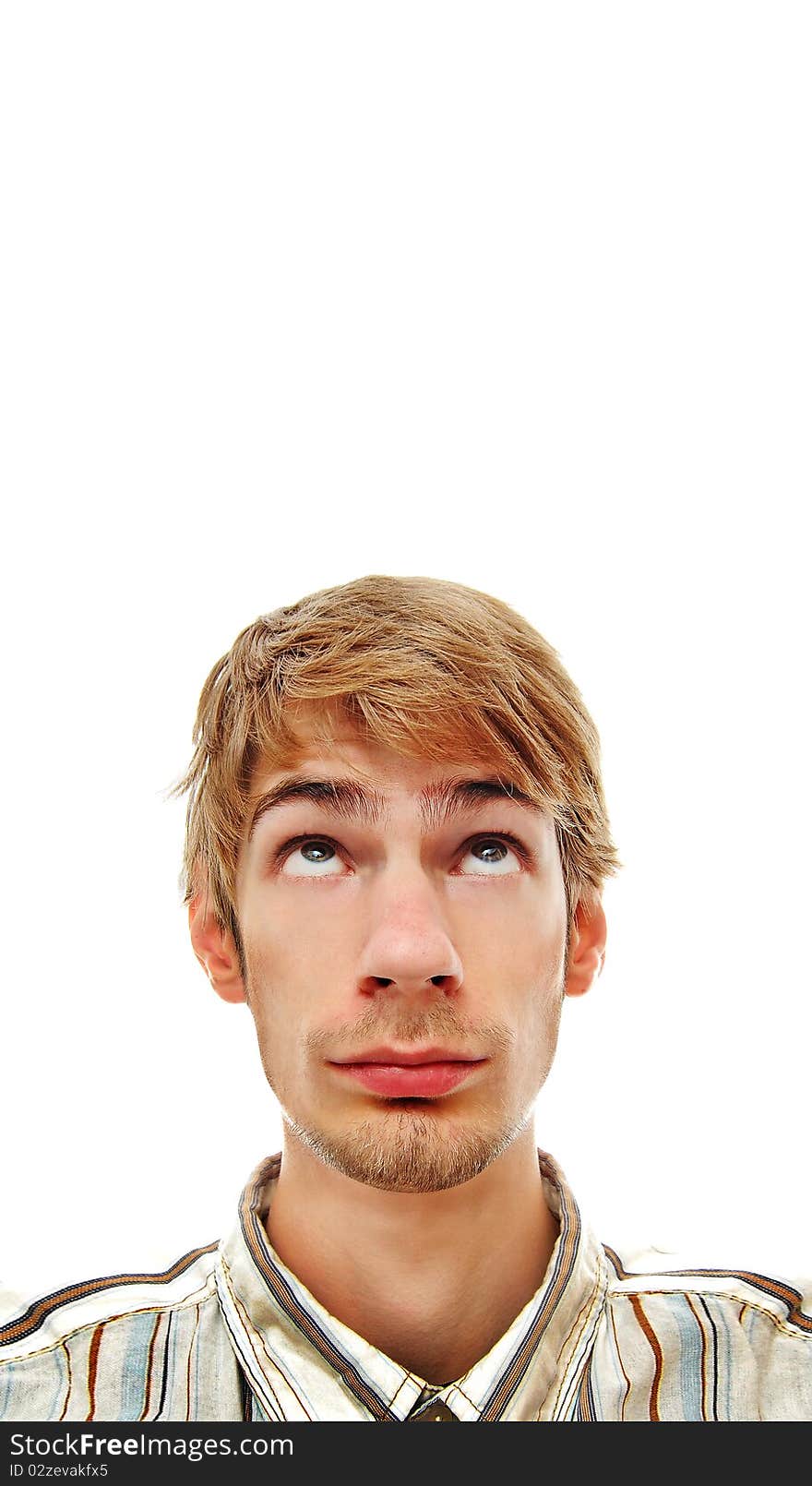 A young adult white Caucasian teenage man looking directly above. Professionally retouched.