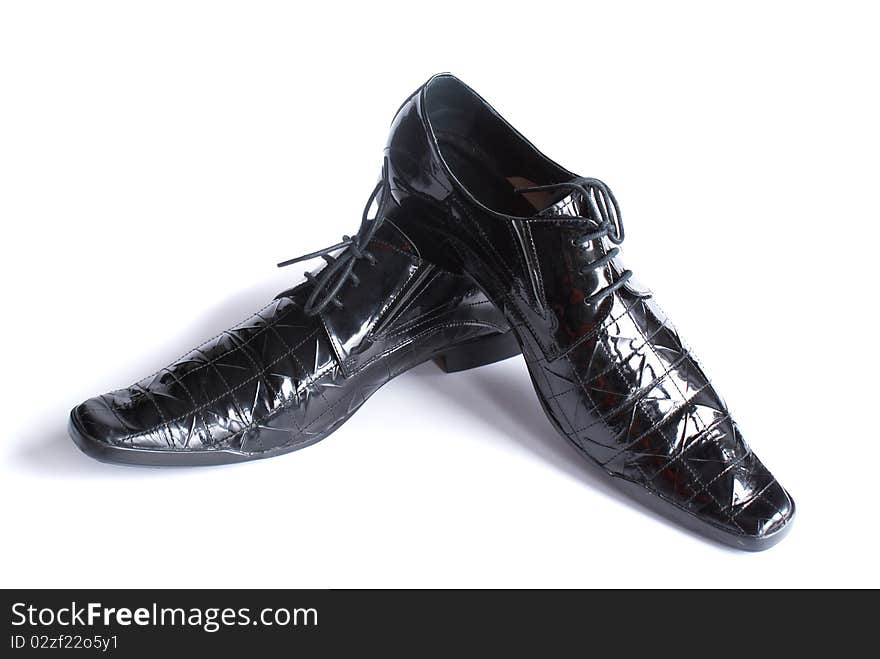 Man's modelling shoes isolated on a white background