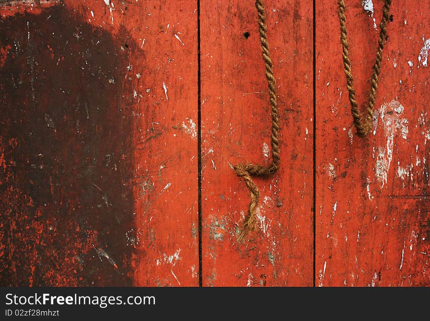 Red colored old wood door. Red colored old wood door.