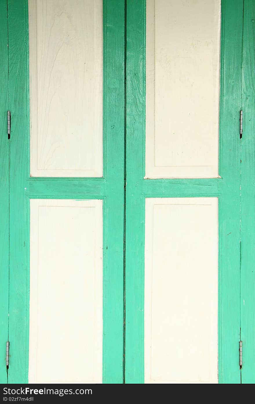 Green frame wood door.