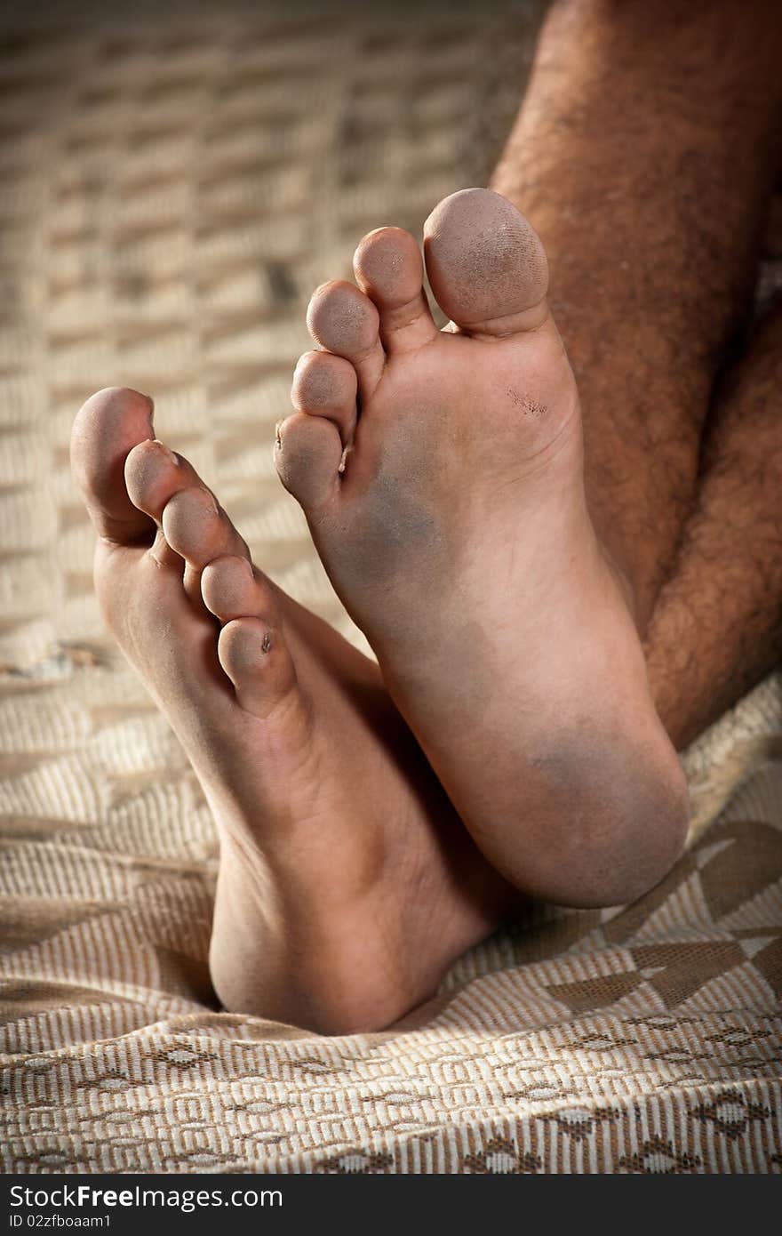 Close up of very dirty feet of man